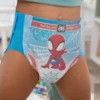 Huggies Pull-Ups Plus Training Pants in Spider-Man design for boys, showcasing their absorbent features and refastenable sides, ideal for potty training.