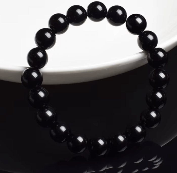 A stylish bloodstone bead bracelet designed to boost energy, promote calmness, attract good luck, and enhance emotional balance, suitable for both men and women.