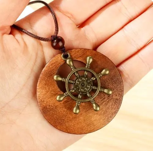 Round wooden ethnic sweater necklace with vintage clock pendant, adding retro charm to any outfit.