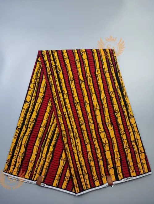 Vibrant real wax print fabric in African patterns, made from 100% cotton for versatile fashion and decor projects.